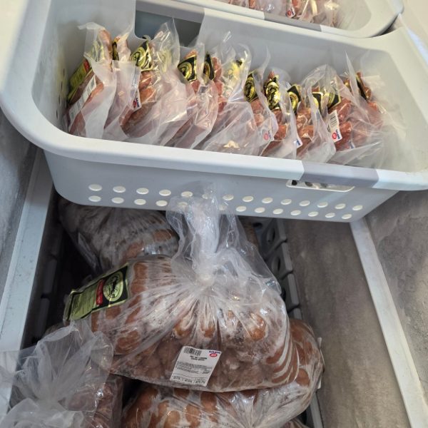 Freezer baskets stocked with packaged Kammann sausage